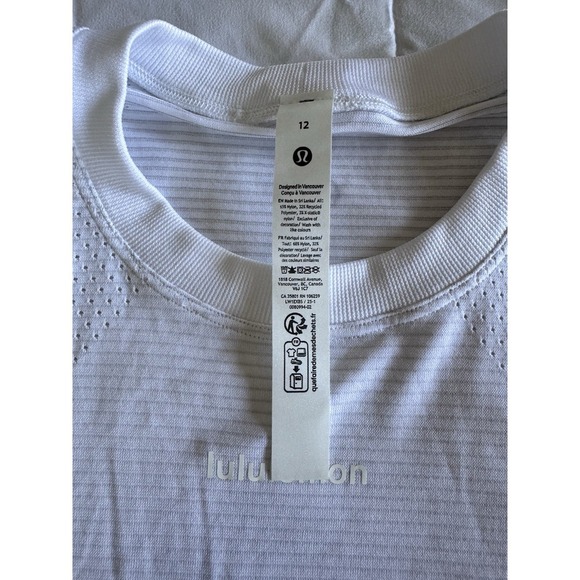 Lululemon SWIFTLY HIGH LOW CROPPED TANK TOP WHITE SIZE 12 Word Logo NWT - Picture 7 of 9